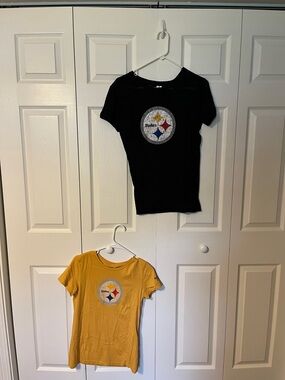 Pittsburgh Steelers t shirts. 2 one gold. One black. Size M